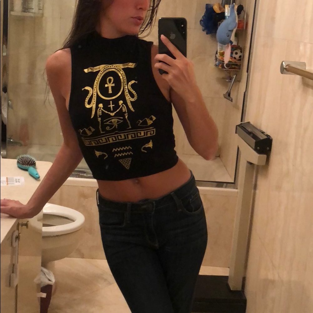 Small, high neck crop top
